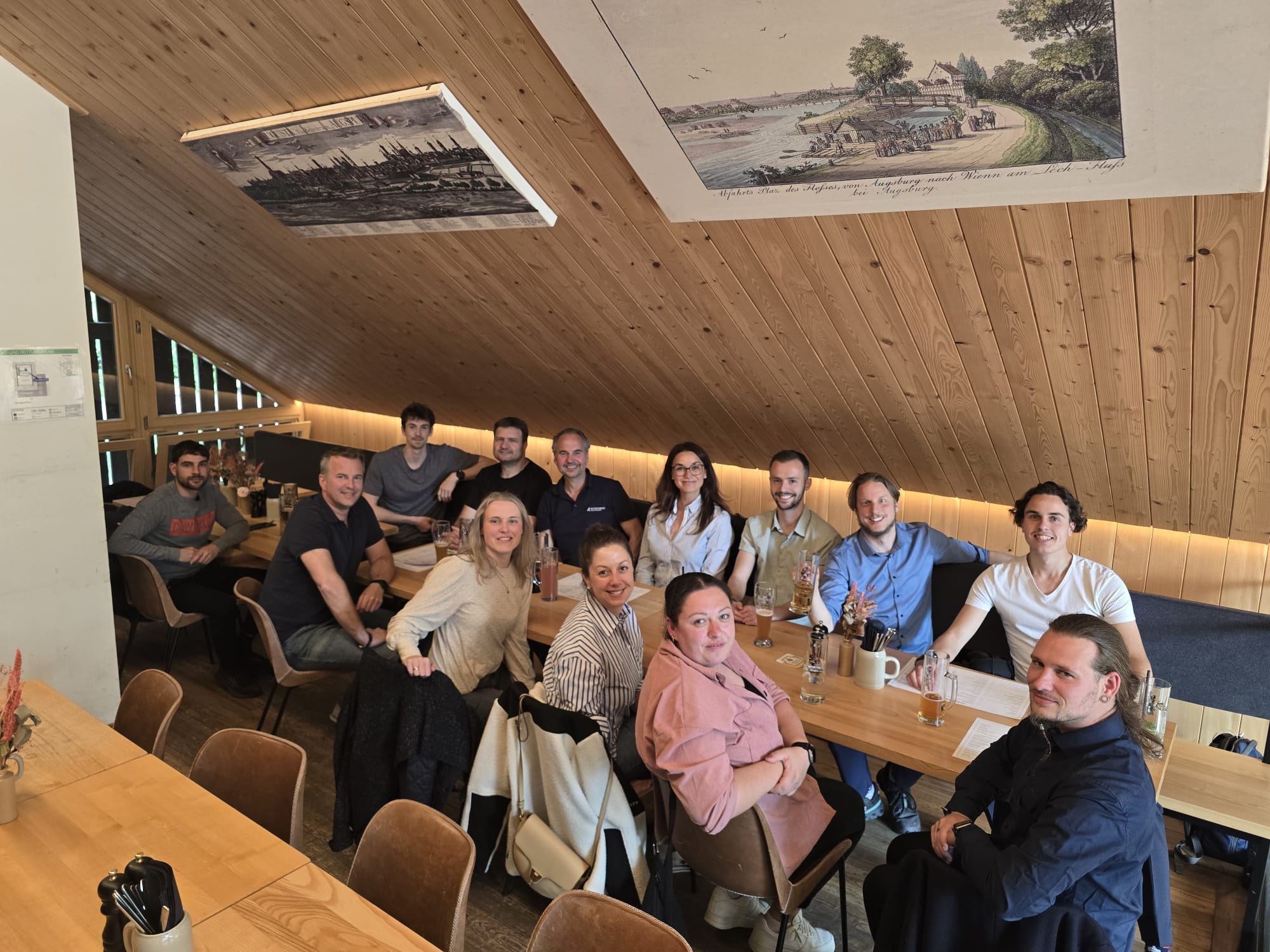 Team von Kutzschbach Innovations beim 9-Jahre-Jubiläum im Restaurant Zur Floßlände, Augsburg